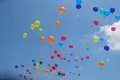 What does the release of balloons mean when someone dies?